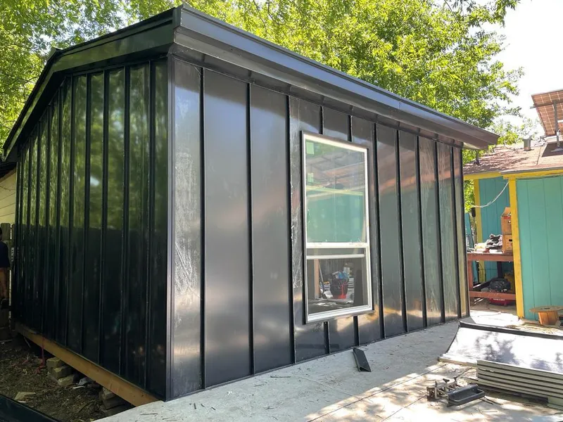 Black standing seam metal wall panels for Roof Inspection in Solebury