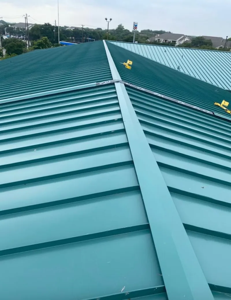 Green commercial metal roof ridge and valley for Metal Roof Repair in Solebury